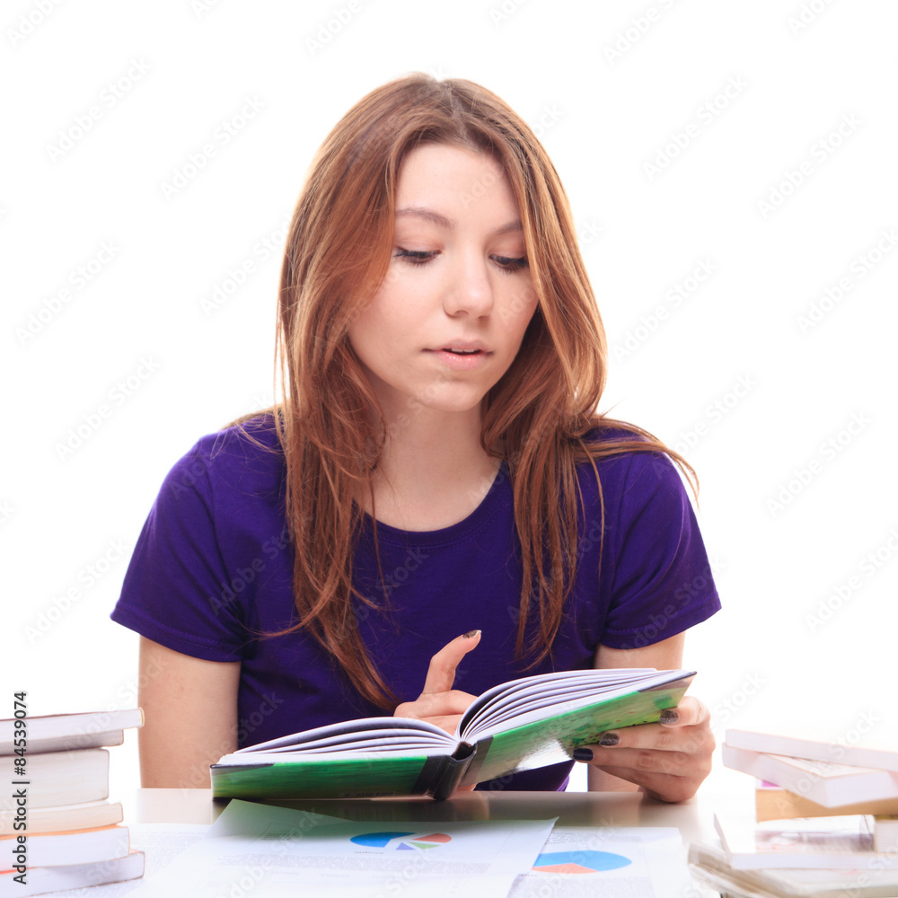 Girl learns from books