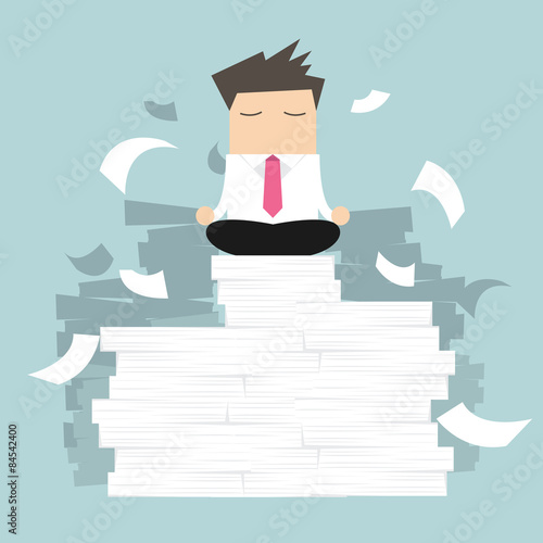 Businessman meditating in peace