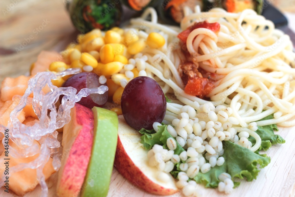 Pasta spaghetti with salad mix fruit. Pasta spaghetti with salad mix fruit.