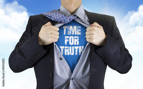businessman showing Time for truth words underneath his shirt