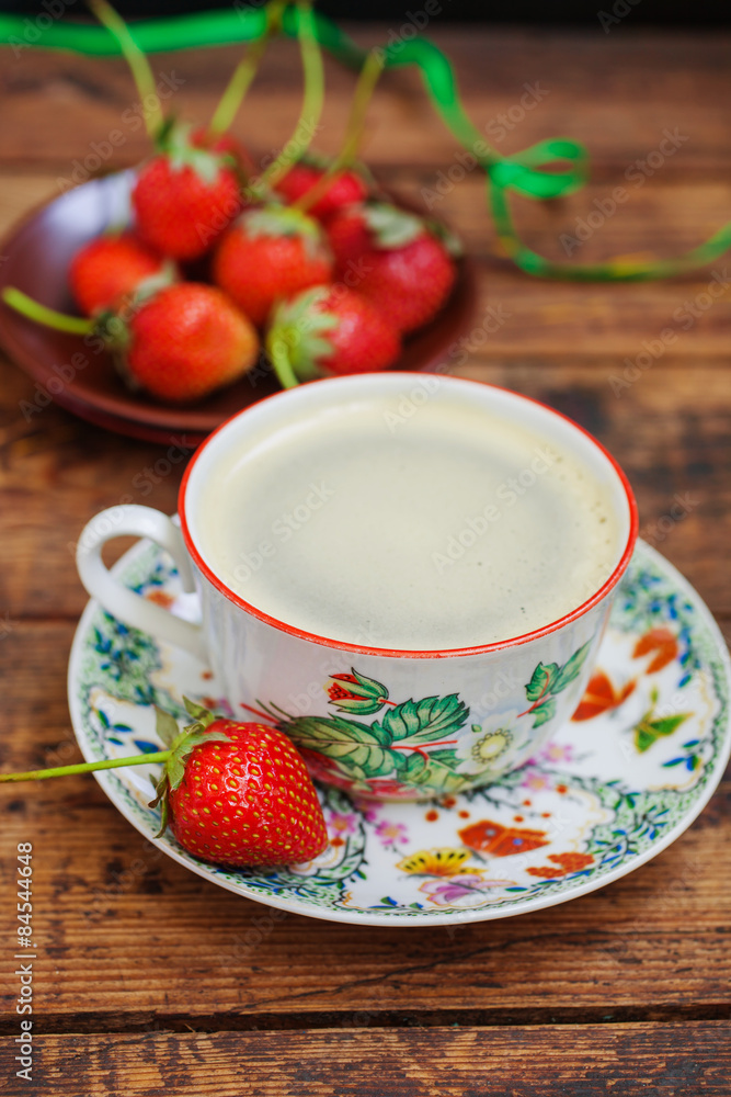coffee in a cup and strawberry coffee in a cup and strawberry
