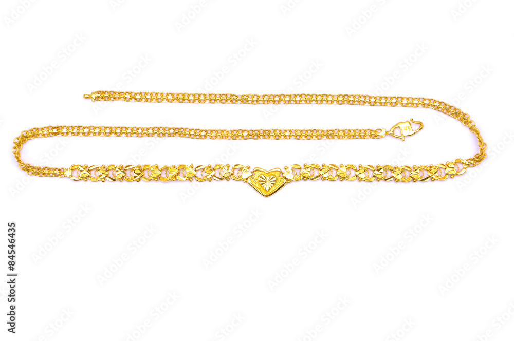 Gold necklace over white background Gold necklace over white background