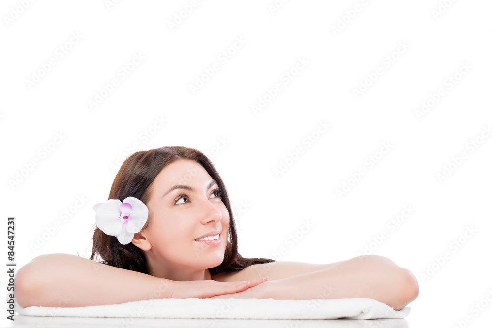 Fototapeta premium beautiful girl on a spa procedure looking at the empty space
