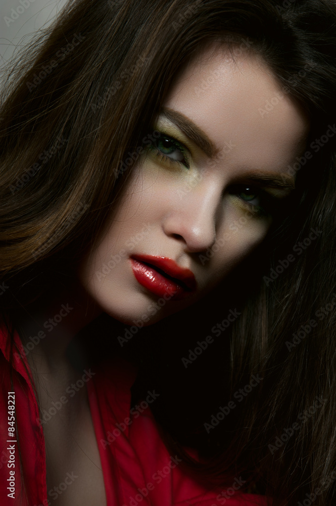 Beauty fashion female model with red lips and red blouse Beauty fashion female model with red lips and red blouse
