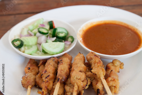 grilled pork satay with peanut sauce and vinegar