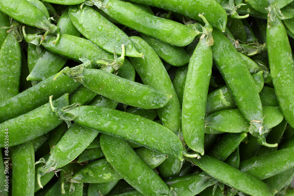 Fresh green peas close-up. The texture of pea Fresh green peas close-up. The texture of pea