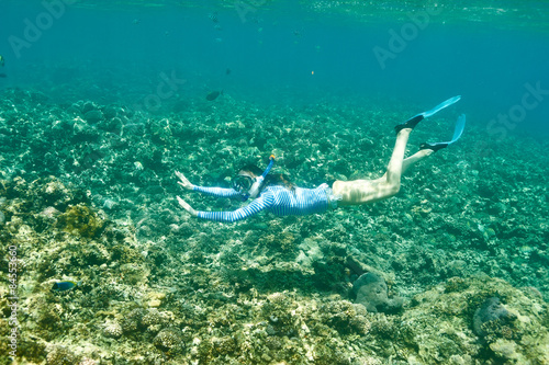 Woman with mask snorkeling