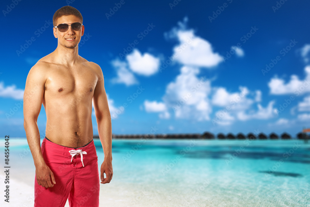 Man on beach at Maldives Man on beach at Maldives