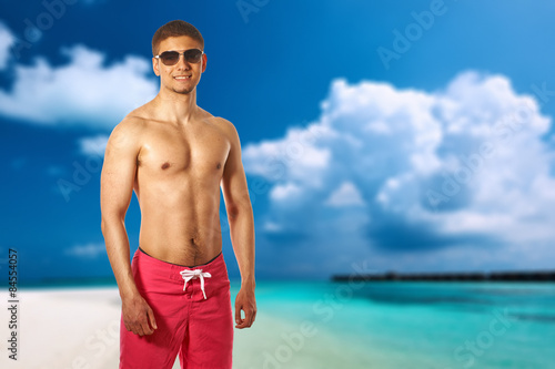 Man on beach at Maldives