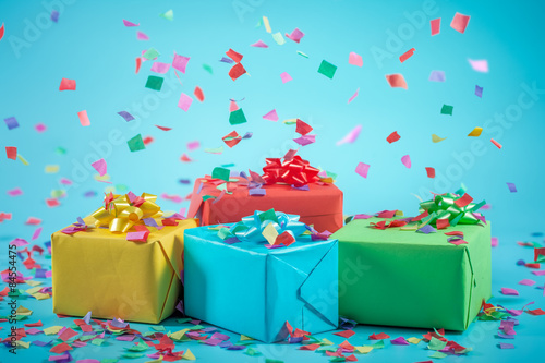 Gift boxes with paper confetti