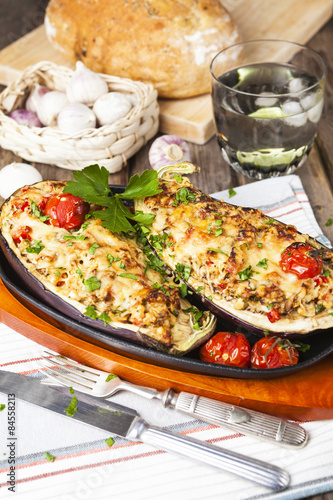 Aubergine stuffed with vegetables and cheese