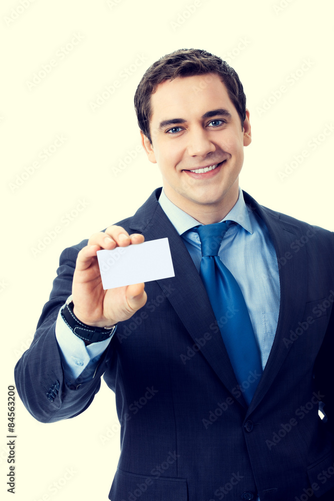 Happy smiling businessman showing blank businesscard Happy smiling businessman showing blank businesscard