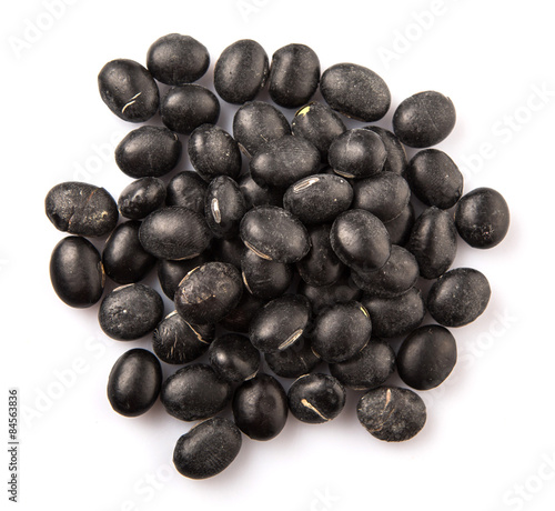 Black beans over white background
