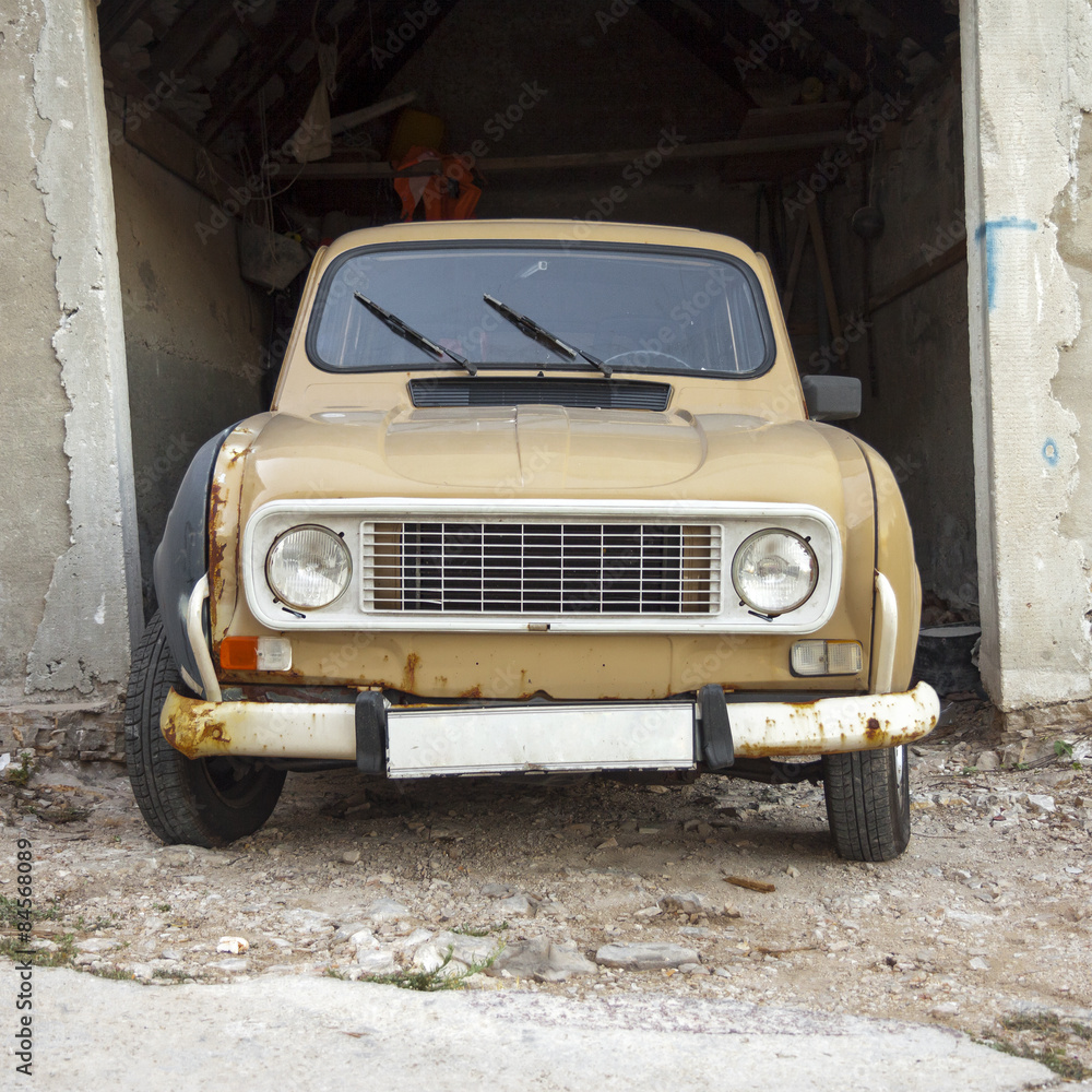 Front view of an old abandoned car