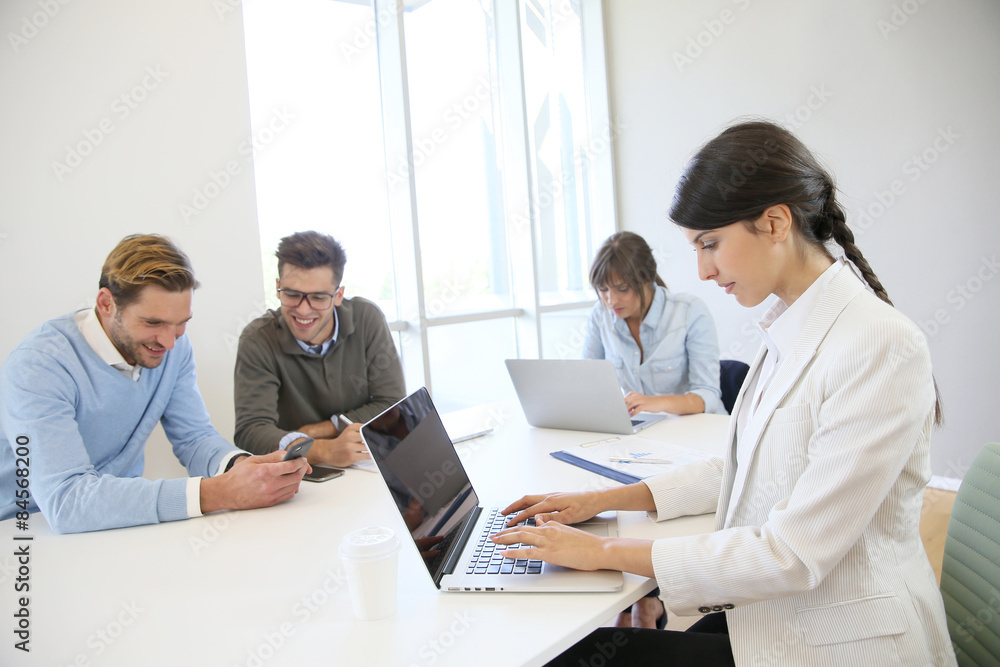 Start-up businesspeople sharing working space Start-up businesspeople sharing working space