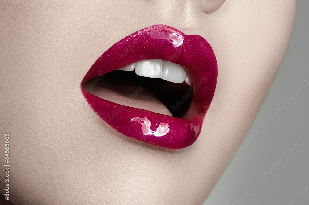 Obraz premium Beauty Makeup with white Skin, pink Lips and white Teeth.