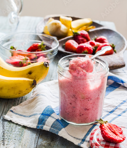 strawberry-banana ice cream in a glass fruit dessert, summer