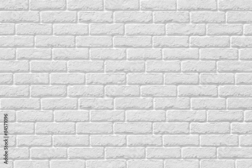 The modern white concrete tile wall background and texture..