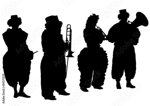 Men walking with a brass instrument