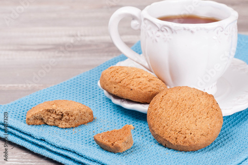 Homemade chocolate chip cookies with a cup of tea