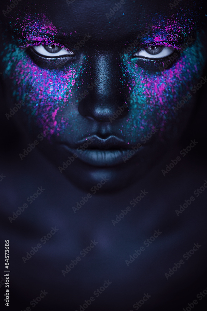 woman in black paint and pink powder woman in black paint and pink powder