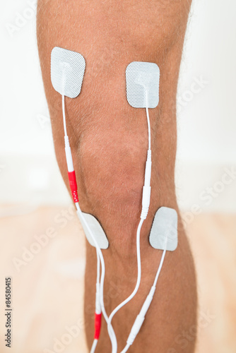 Person Leg With Electrodes On Knee