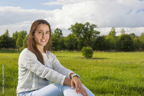 Canvas Print Beautiful teenager on the grass