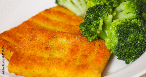 fried breaded fish fillets with broccoli