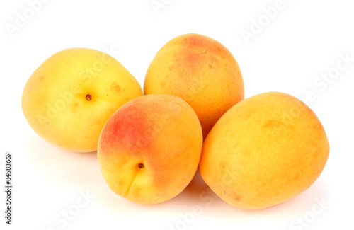 yellow plums on a white background