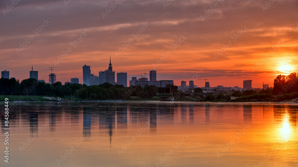 View of the city center from the river at sunset. HDR - high dynamic range