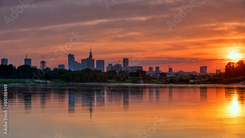 View of the city center from the river at sunset. HDR - high dynamic range