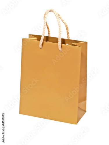 Empty golden gift bag.Isolated on white background.