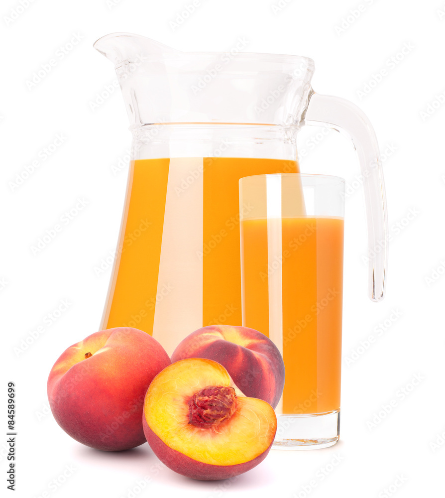 Peach fruit juice in glass jug