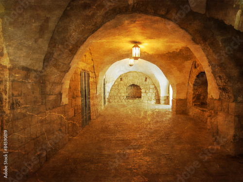 Ancient Alley in Jewish Quarter, Jerusalem. .Photo in old color image style.