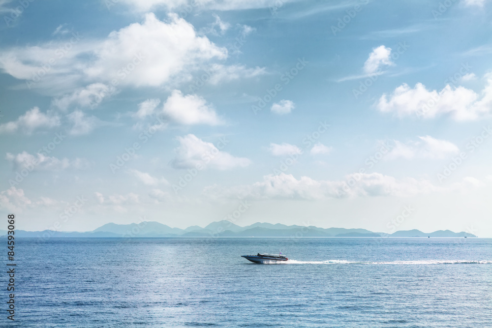 Speed boat moving on blue tropical sea Thailand