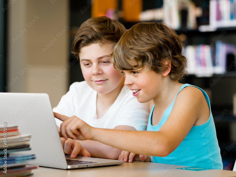 Two boys in library Two boys in library