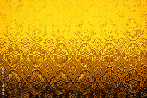 Dark gold stained glass texture background