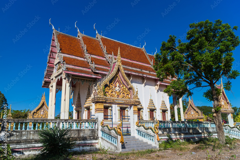 Temple with tree and clear sky at Wat Khok Sawang
