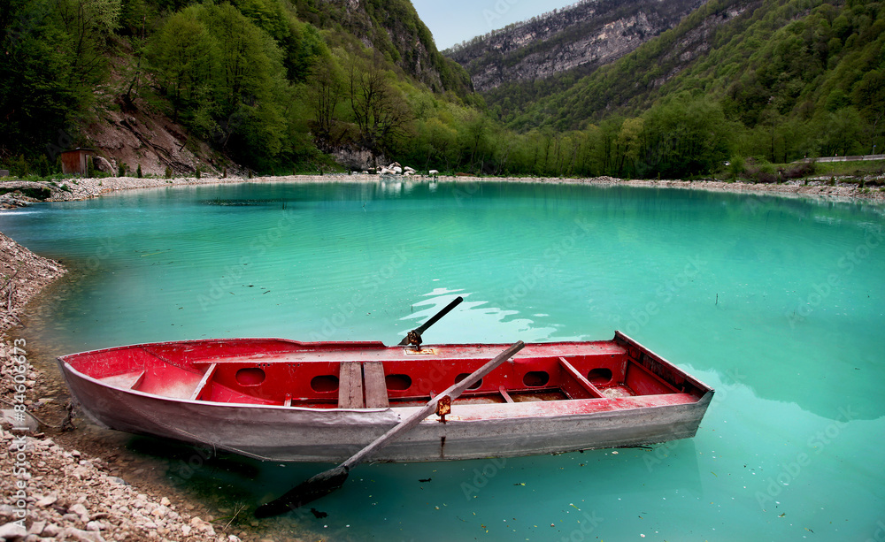 Boat on turquoise lake
