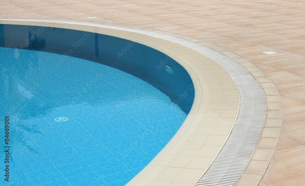 Detail of open air swimming pool with clean blue water