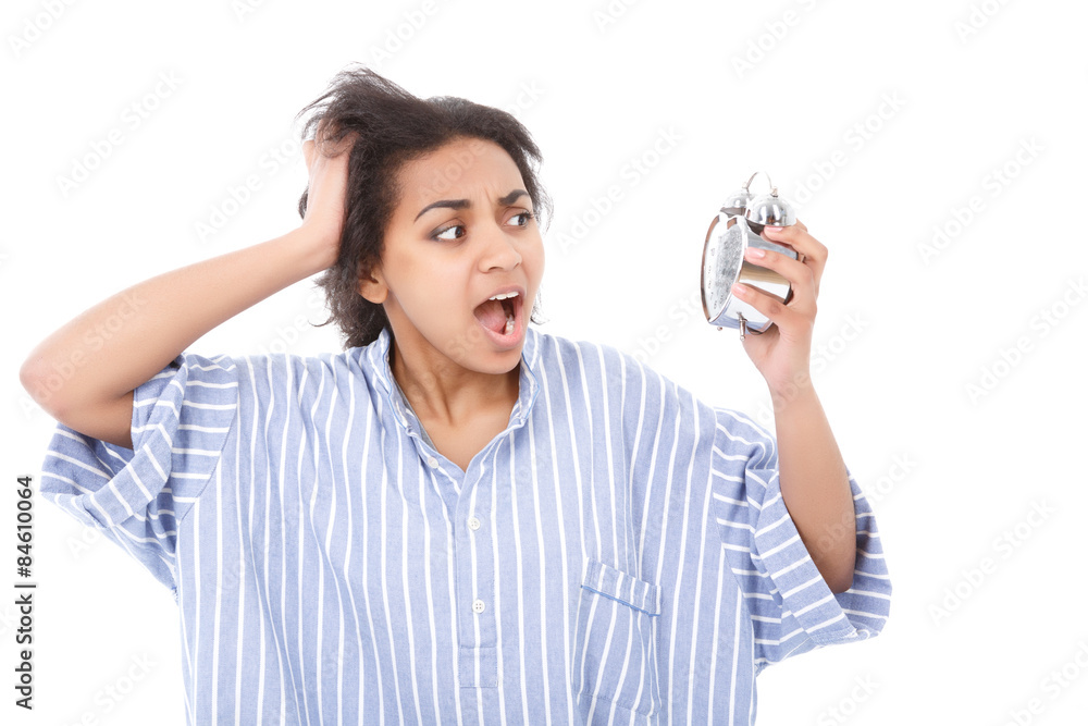 Excited young woman with alarm clock Excited young woman with alarm clock