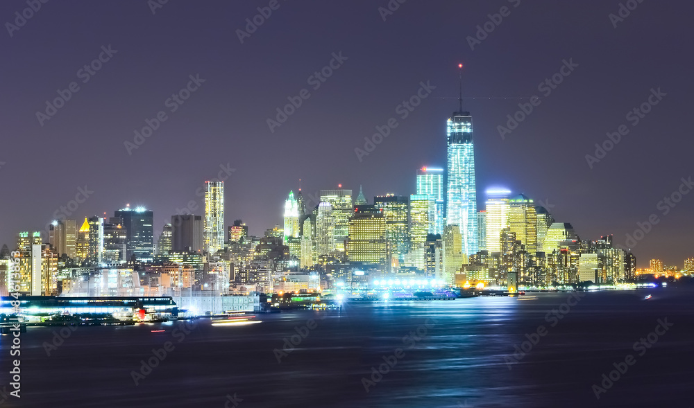 Lower Manhattan skyline at night.