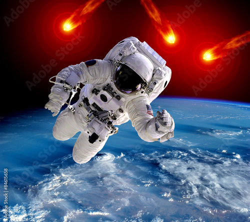 Fototapeta Naklejka Na Ścianę i Meble -  Astronaut Spaceman Asteroid Meteor