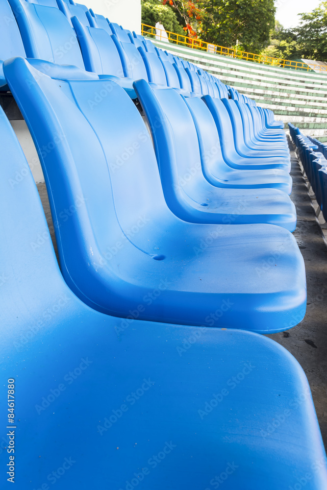 Fototapeta premium Empty blue seats or chair rows in stadium