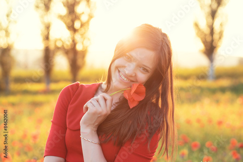 Woman in field in sunlight