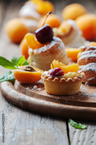 Sweet tarts with cherry and apricot