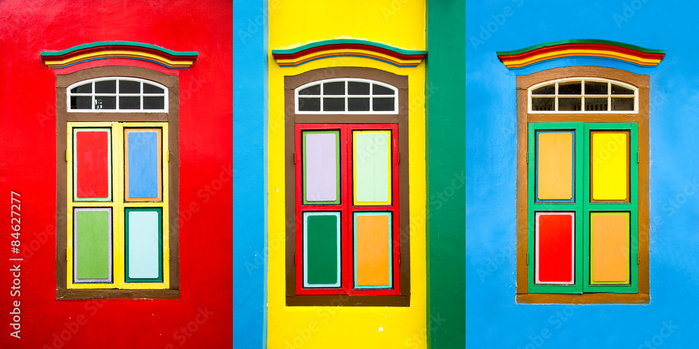 Obraz premium Collage of 3 colorful windows on the facade of a house in Little India, Singapore