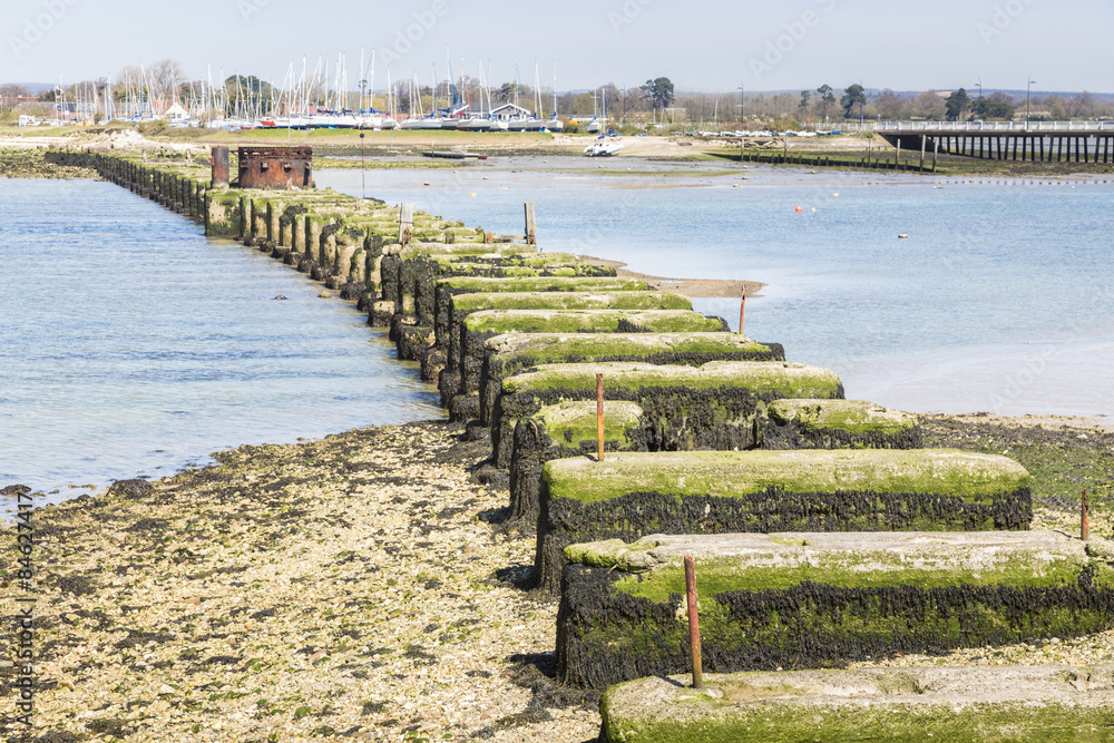 Fototapeta premium Chichester Harbour, Hayling Billy former railway bridge and trackbed, from Hayling Island to Havant in the Solent, southern England, Hampshire, UK
