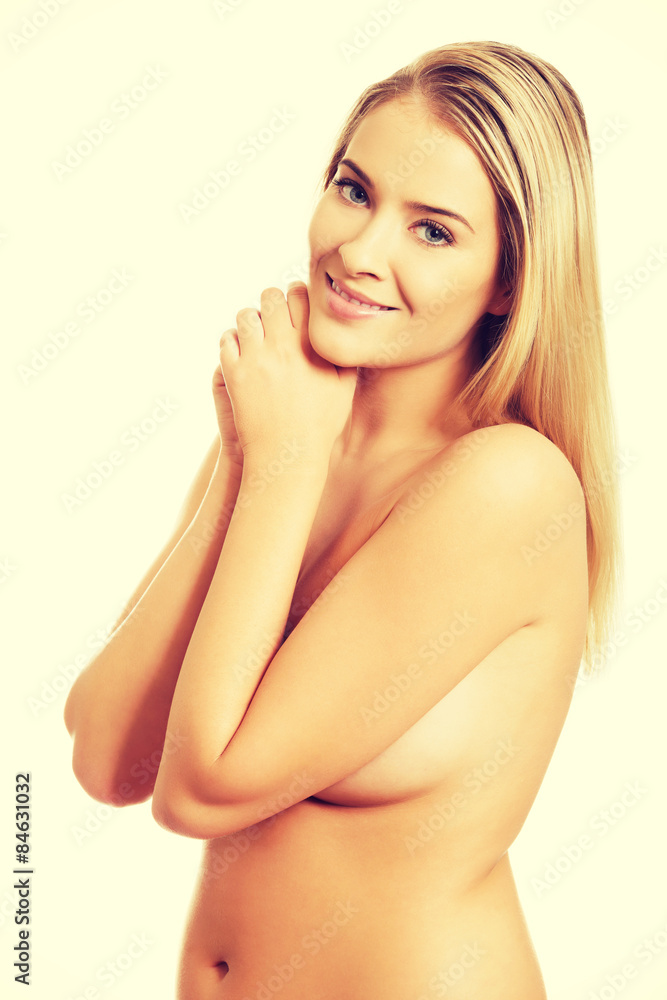 Portrait of nude woman covering her breast Portrait of nude woman covering her breast