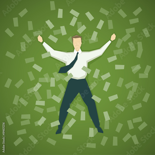 Businessman lying in a pile of money